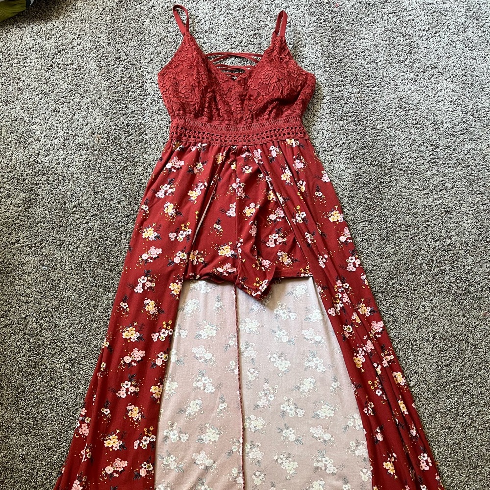Orange patterned romper with train, cami top with lace on the outside